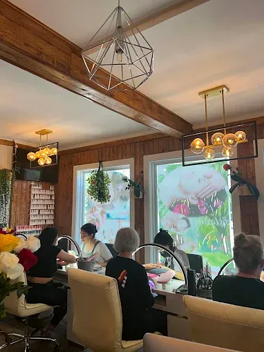Clients at the nail bar during manicures